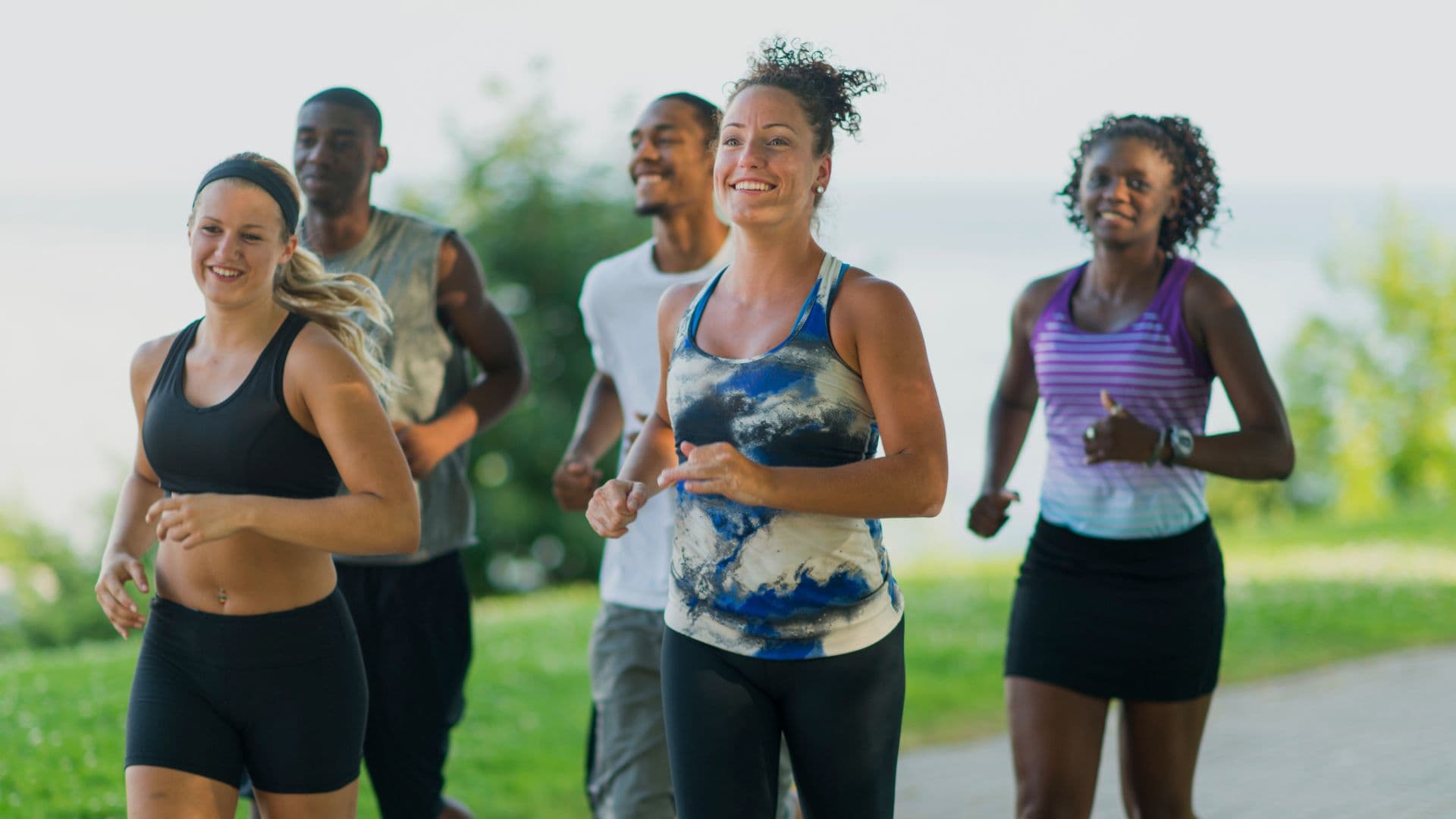 A runner outdoors on a welcoming trail.